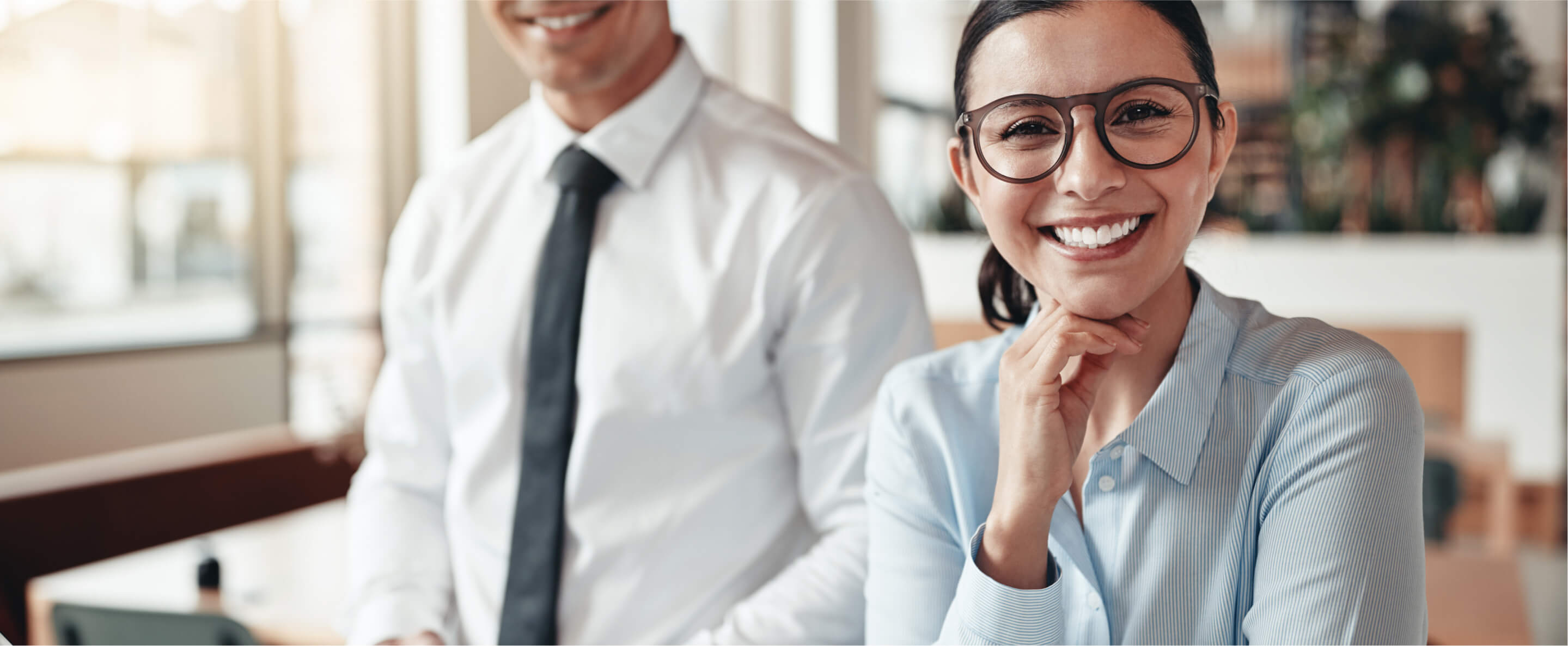 Women and man smiling